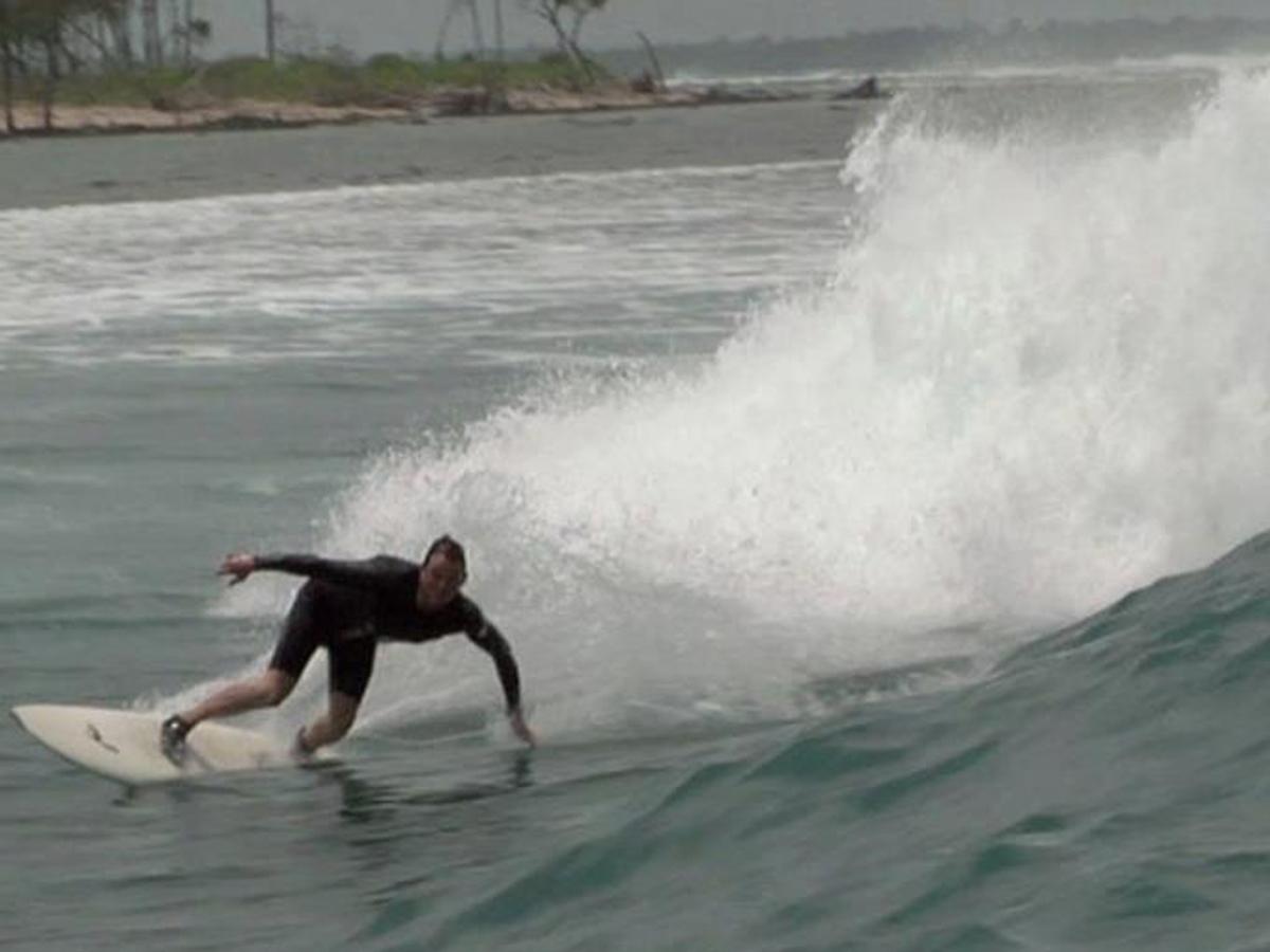 Jess Ponting surfing Maccas