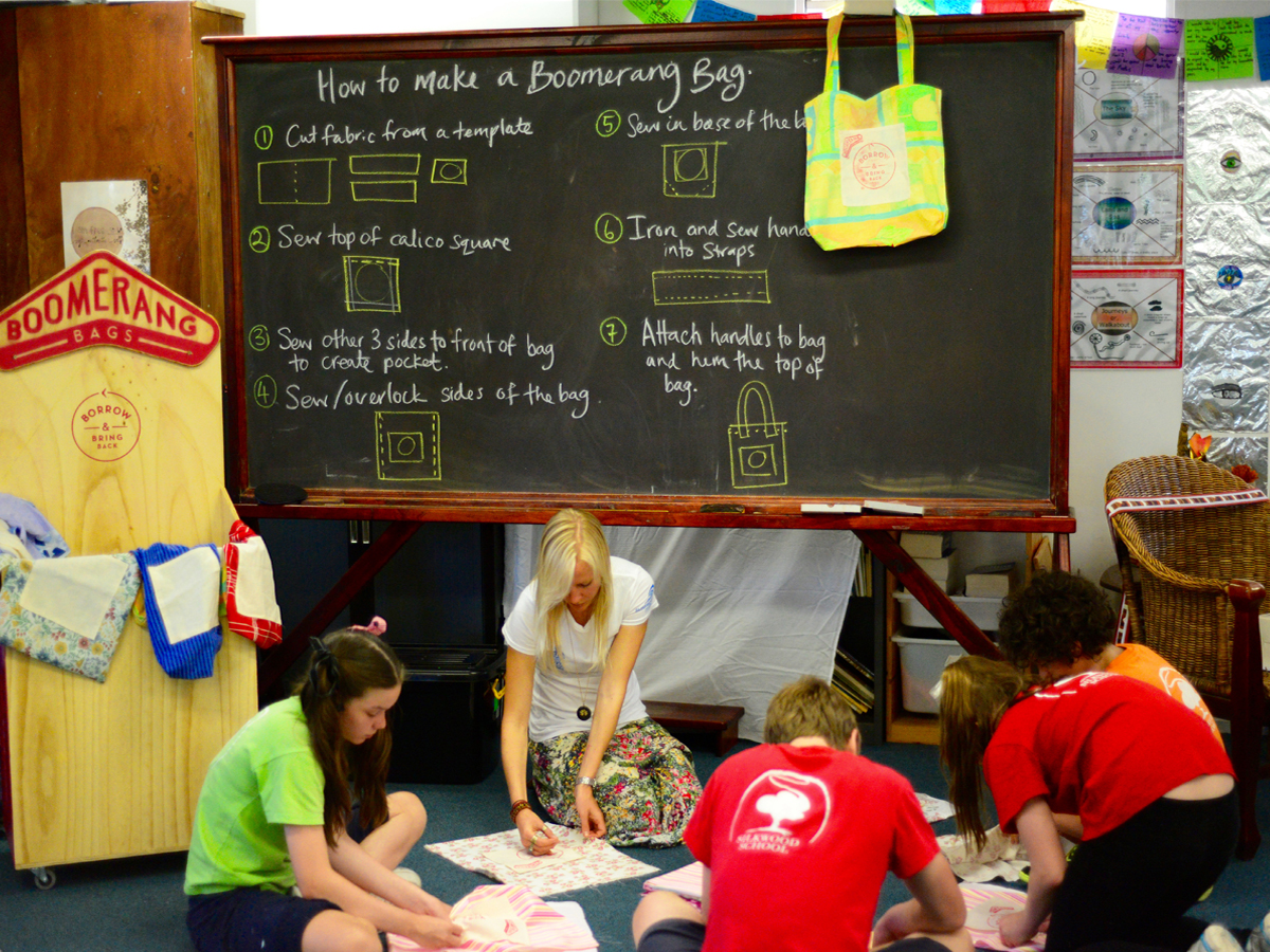 Jordyn and school kids in action